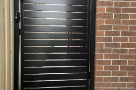 Black slat gate - Blue Sovereign Fences and Gates
