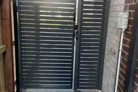 Metal slat gate and wing - Blue Sovereign Fences and Gates